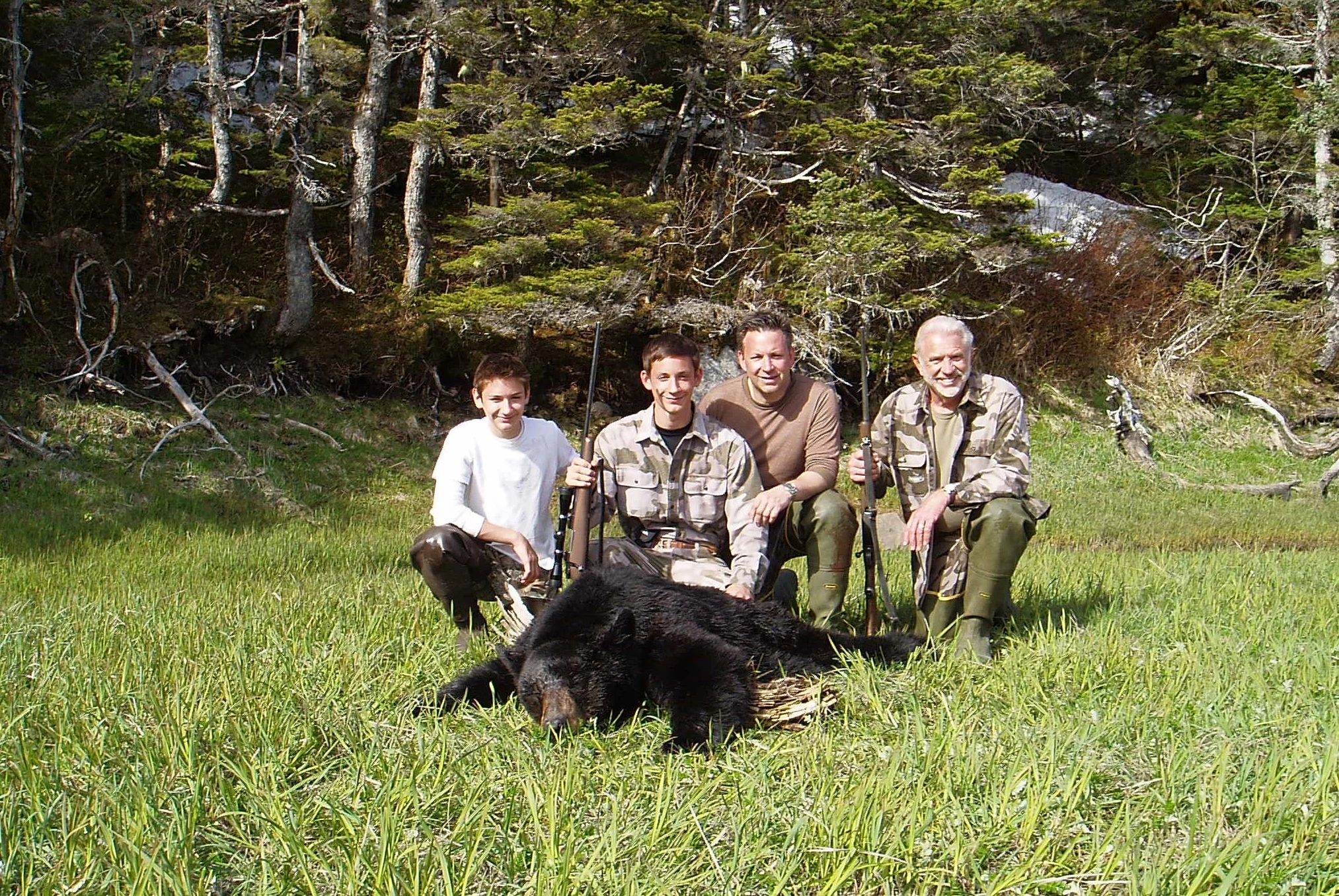 Jared with his 6'5" black bear. From (L to R) Nathan, Jared, son-in-law Sagen and myself. According to the Alaska Department of Fish & Game this bear was 32 years old. I did some research and only found one bear that was older. It was a 33 year old tagged bear taken in Wisconsin.