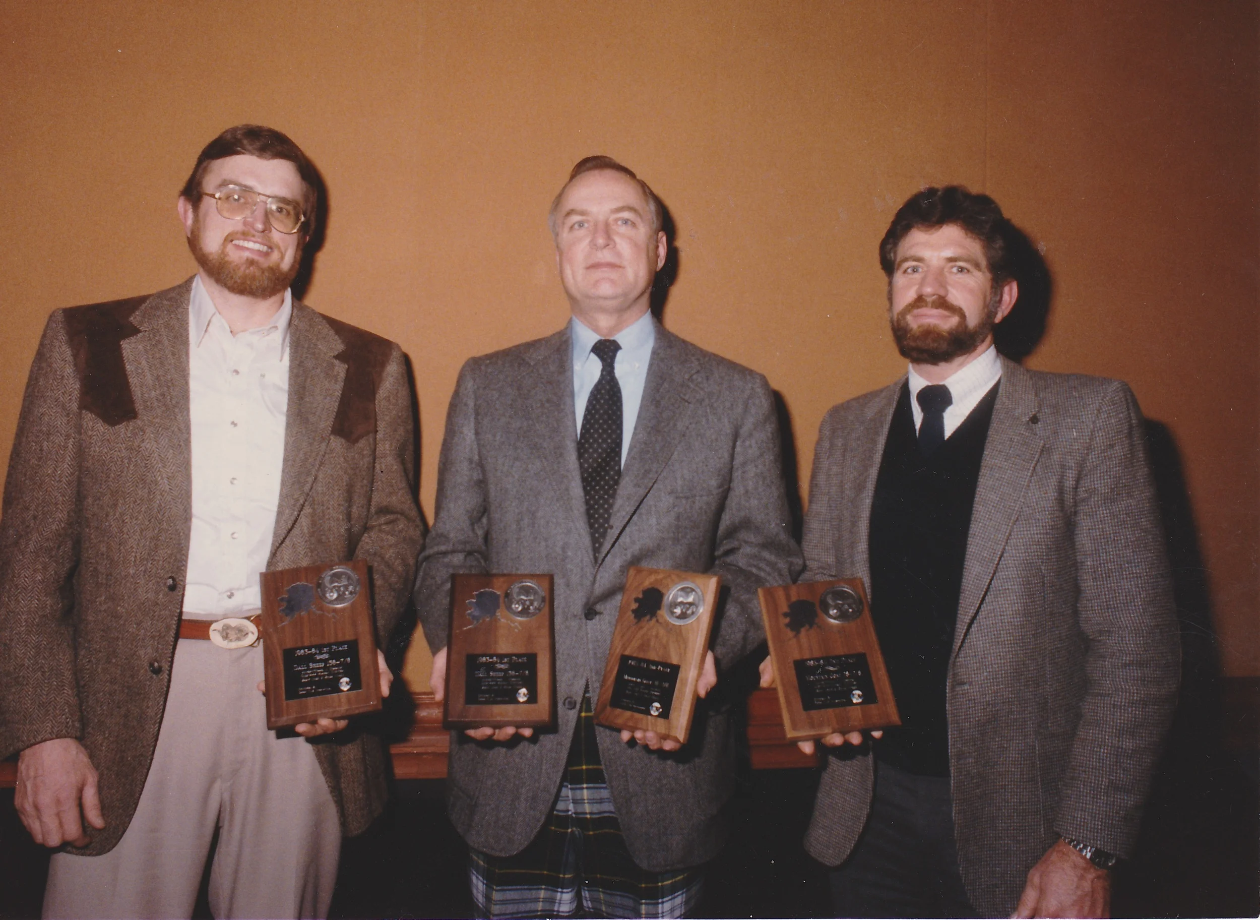 Brent, Mike Dobransky and me receiving our SCI Award Plaques at the 1985 Alaska Professional Hunters Association Banquet. These were for our first season.