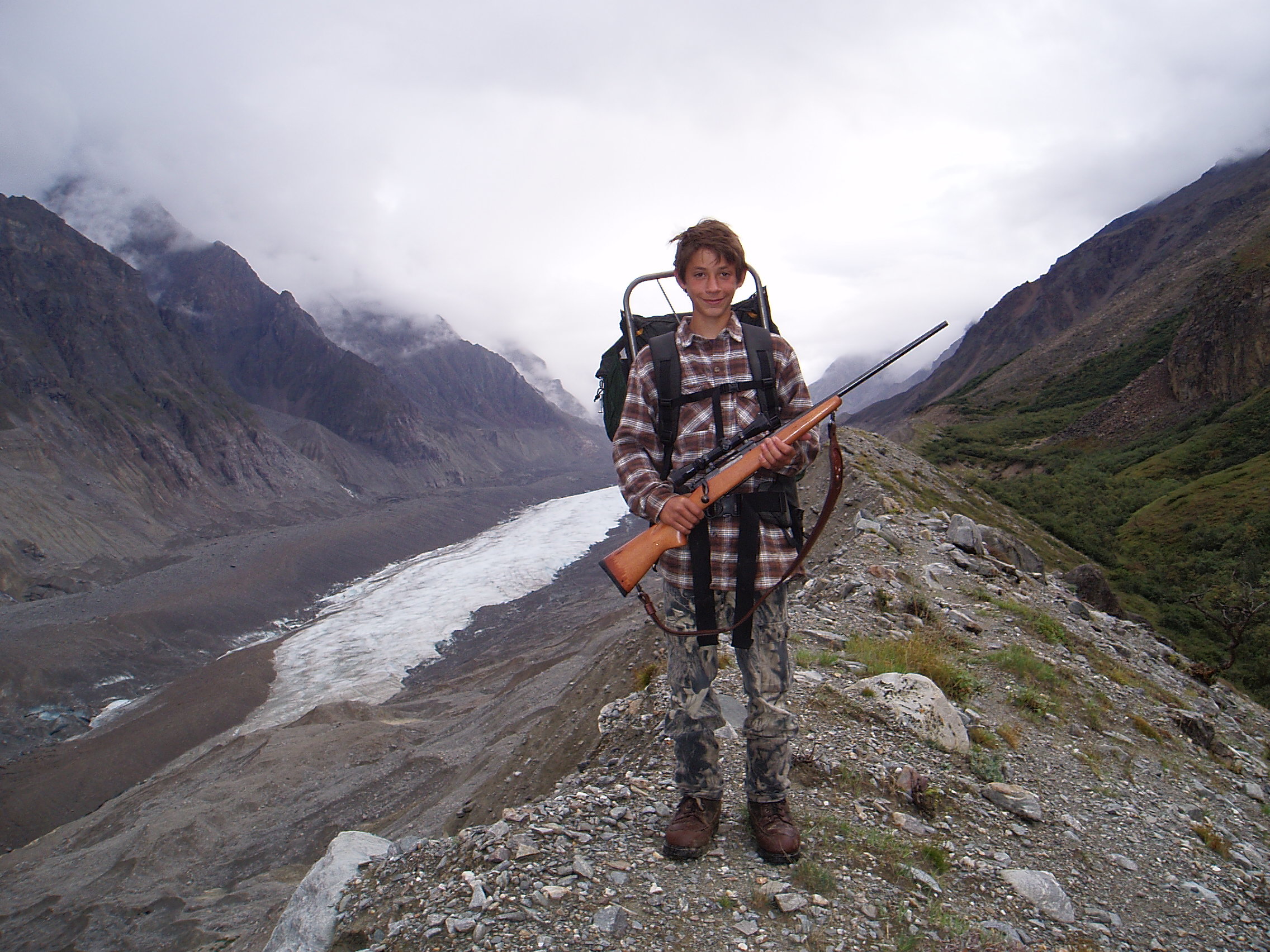 The sheep hunter. Jared on his first sheep hunt after sleeping out without a sleeping bag, ready for the long walk out.