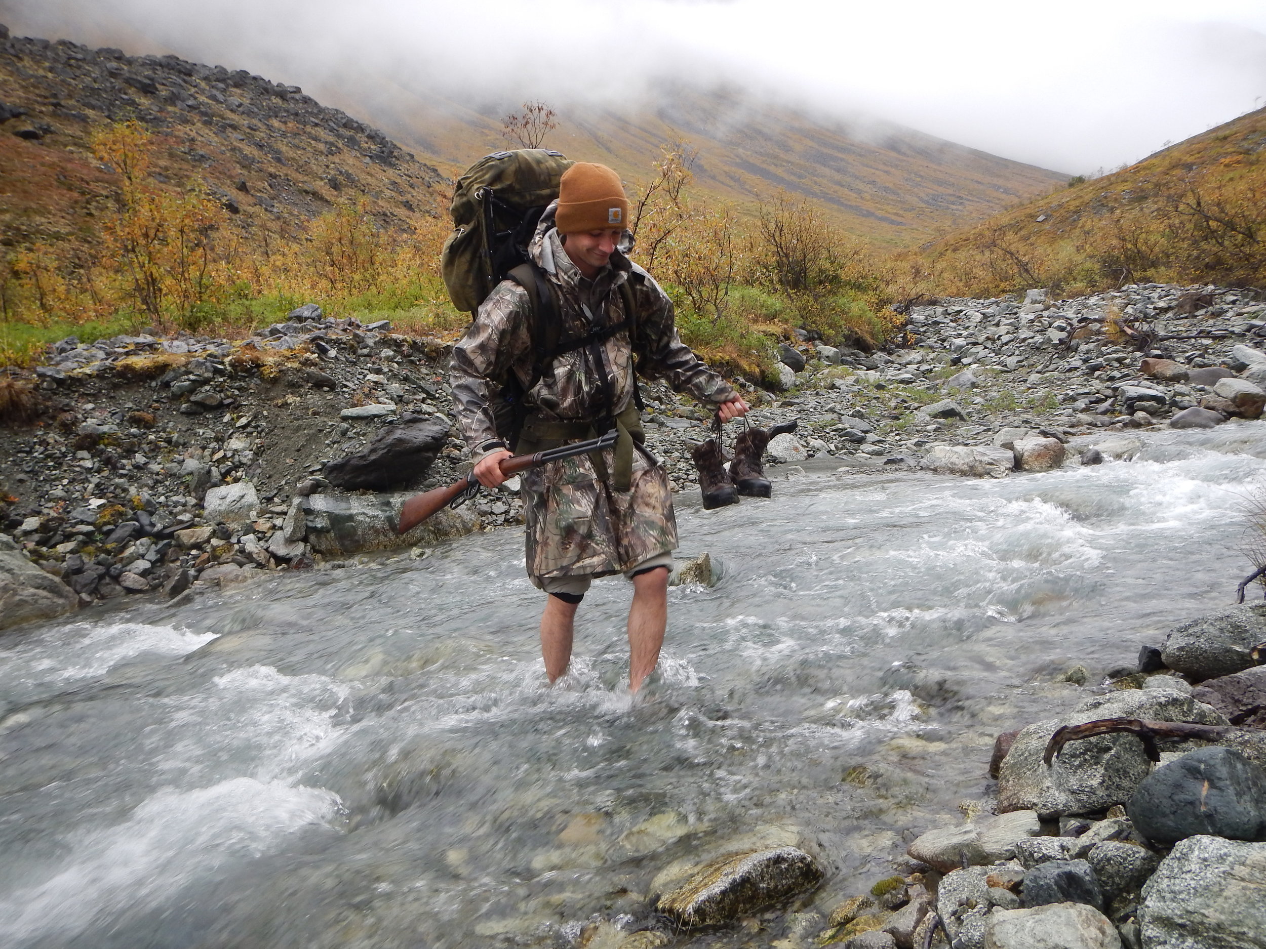Jared crossing the creek.