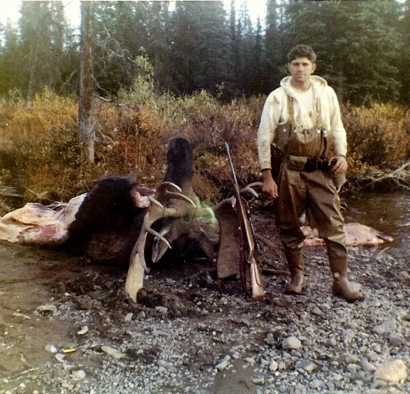My first moose, a 48 incher. I was really crazy for wearing chest waders. 