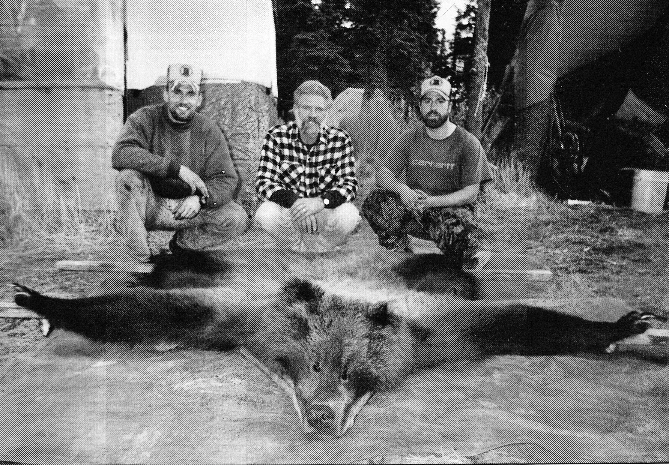 (L to R) Eric, myself and Thor with Stan Bocian's brown bear that we recovered.