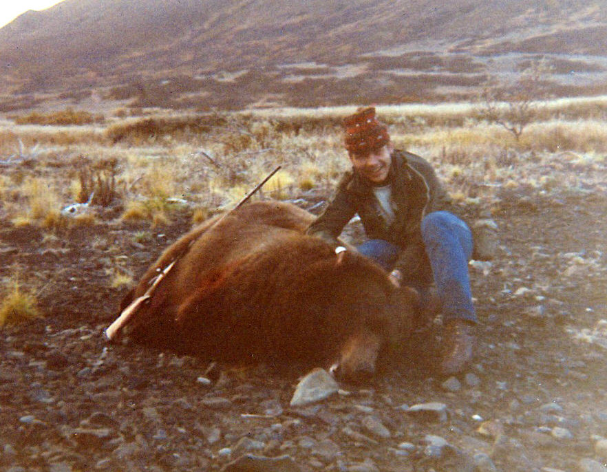 Russ with his 8'10" brown bear taken in Wide Bay.