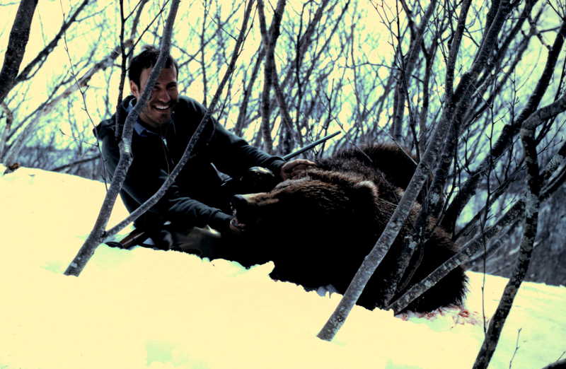 Doug with his 7'8" brown bear taken at Chignik Lake. It was traveling in the snow.