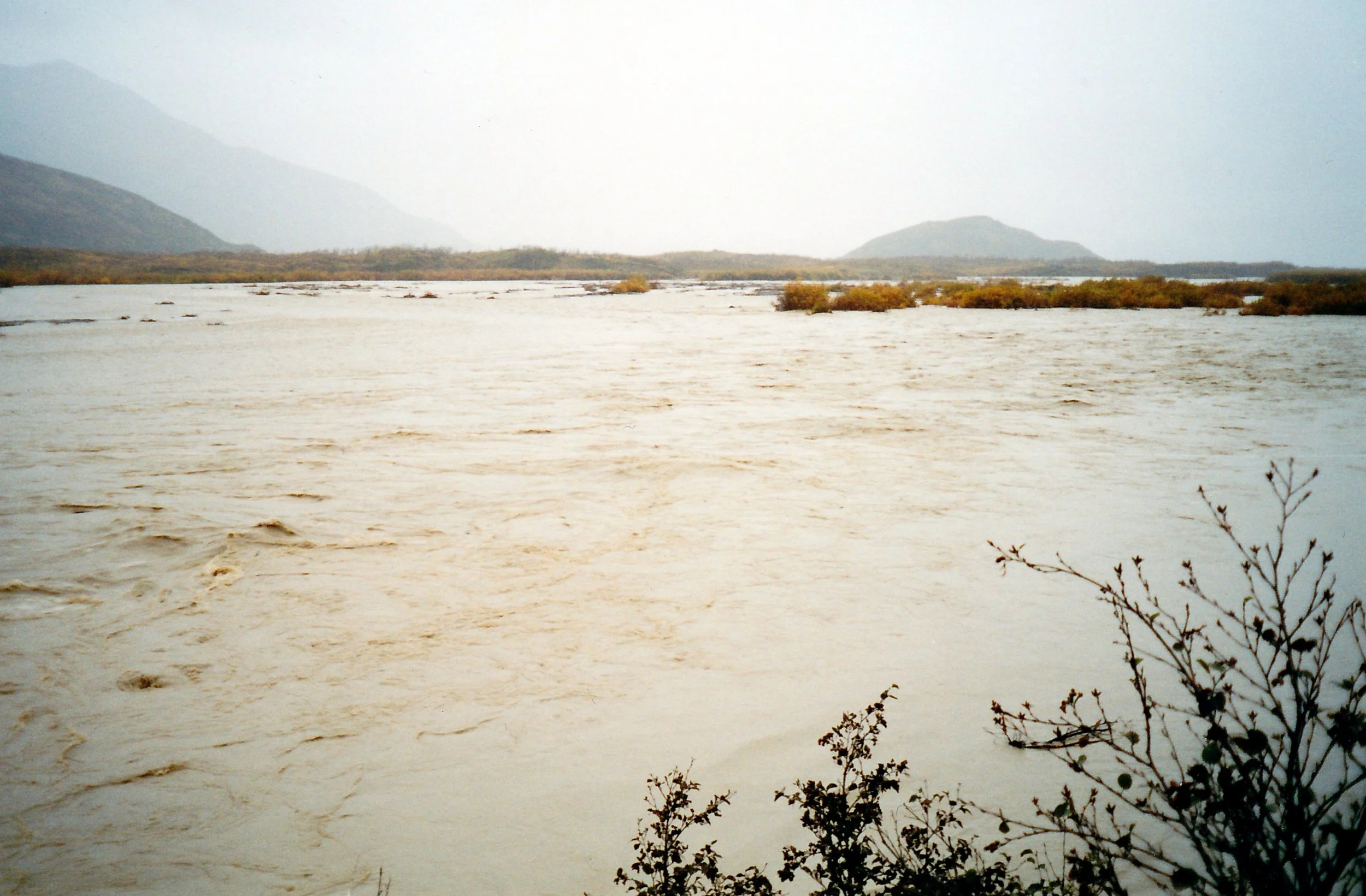 The Dog Salmon River camp during an October flood.