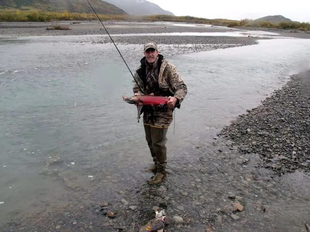 Pete Clark, one of Brent's hunters with a salmon he caught during normal water levels.