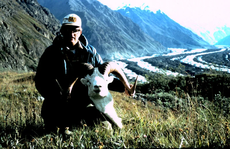 Brent in the field where we camped with his 40" ram. The area in the far background is where Dick and I hunted.