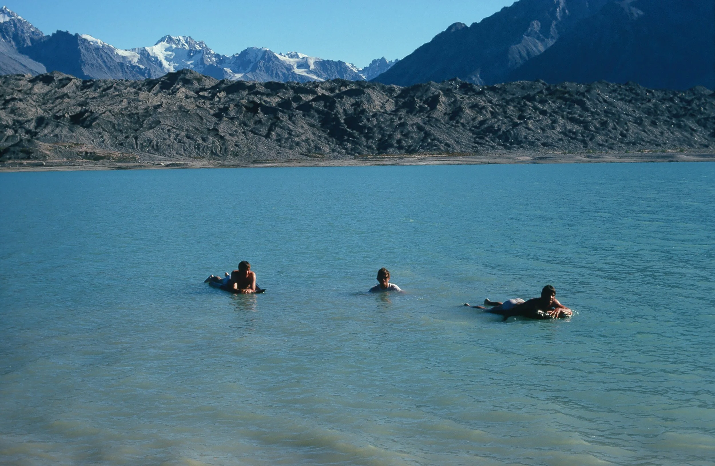 Taking the cold plunge. Nothing but melted ice. Brent is the one without an air mattress.
