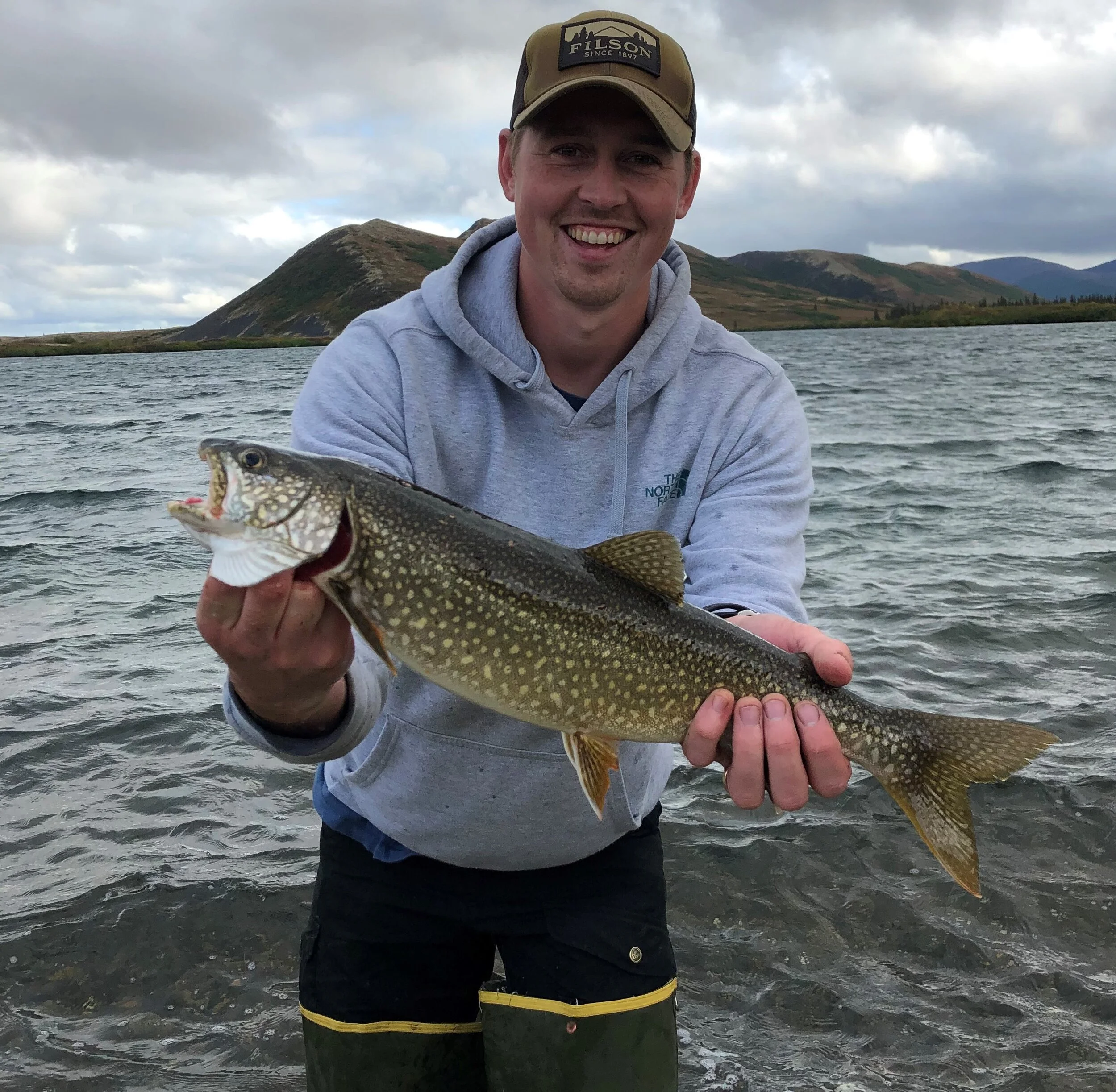 Nate with supper. Nice Lake Trout!