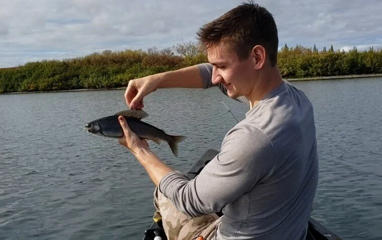 Nathan with one of the only two Grayling we caught.