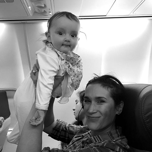 Taken by the nice man sitting next to us on our flight to Chicago. 