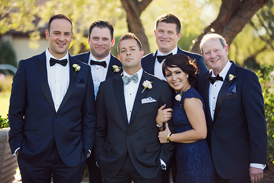 Team Groom. Navy blue tuxes from T he Black Tux . Navy lace dress from Watters. 