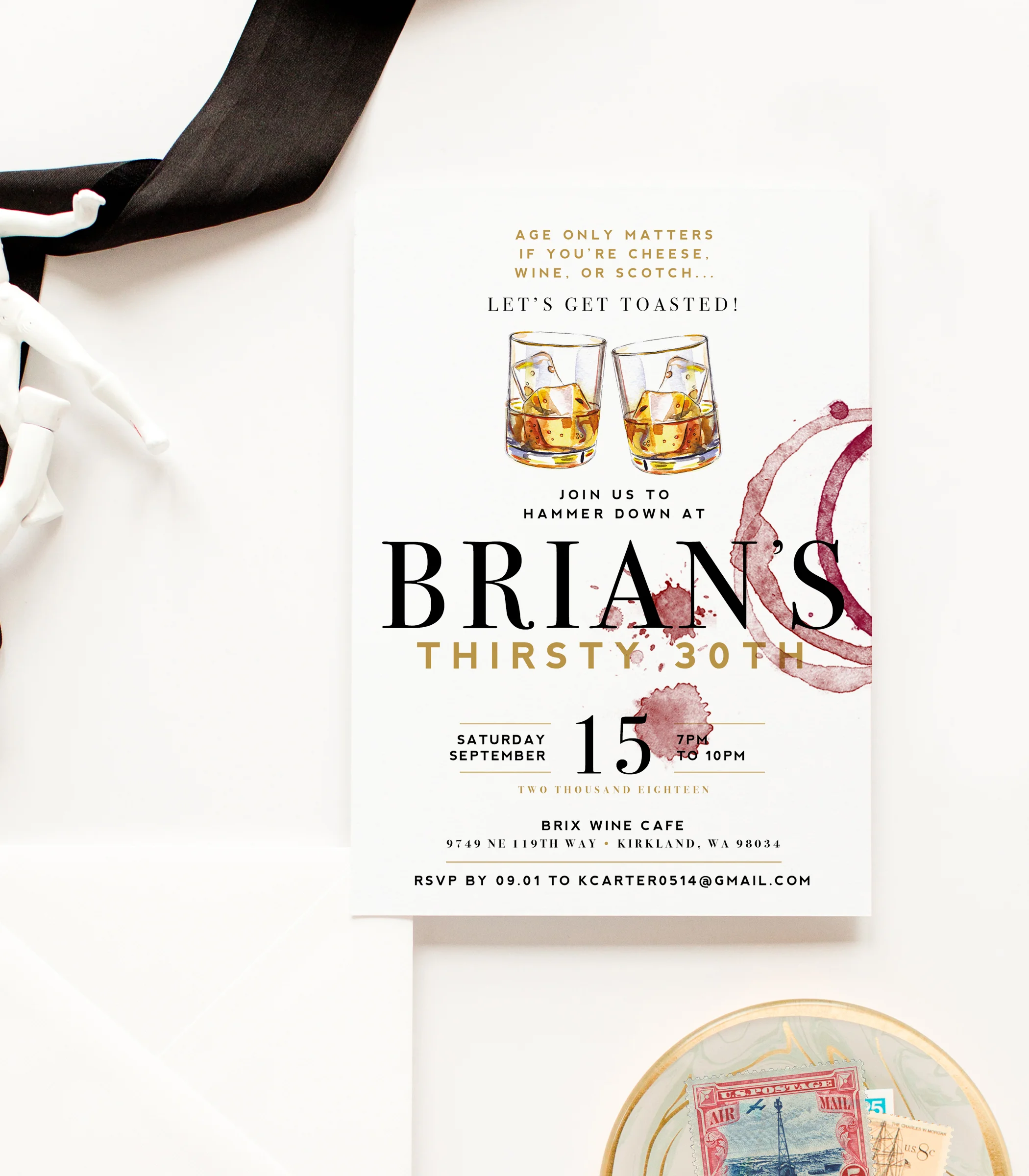 Flatlay of Men's Scotch Themed Birthday Party Invite - front