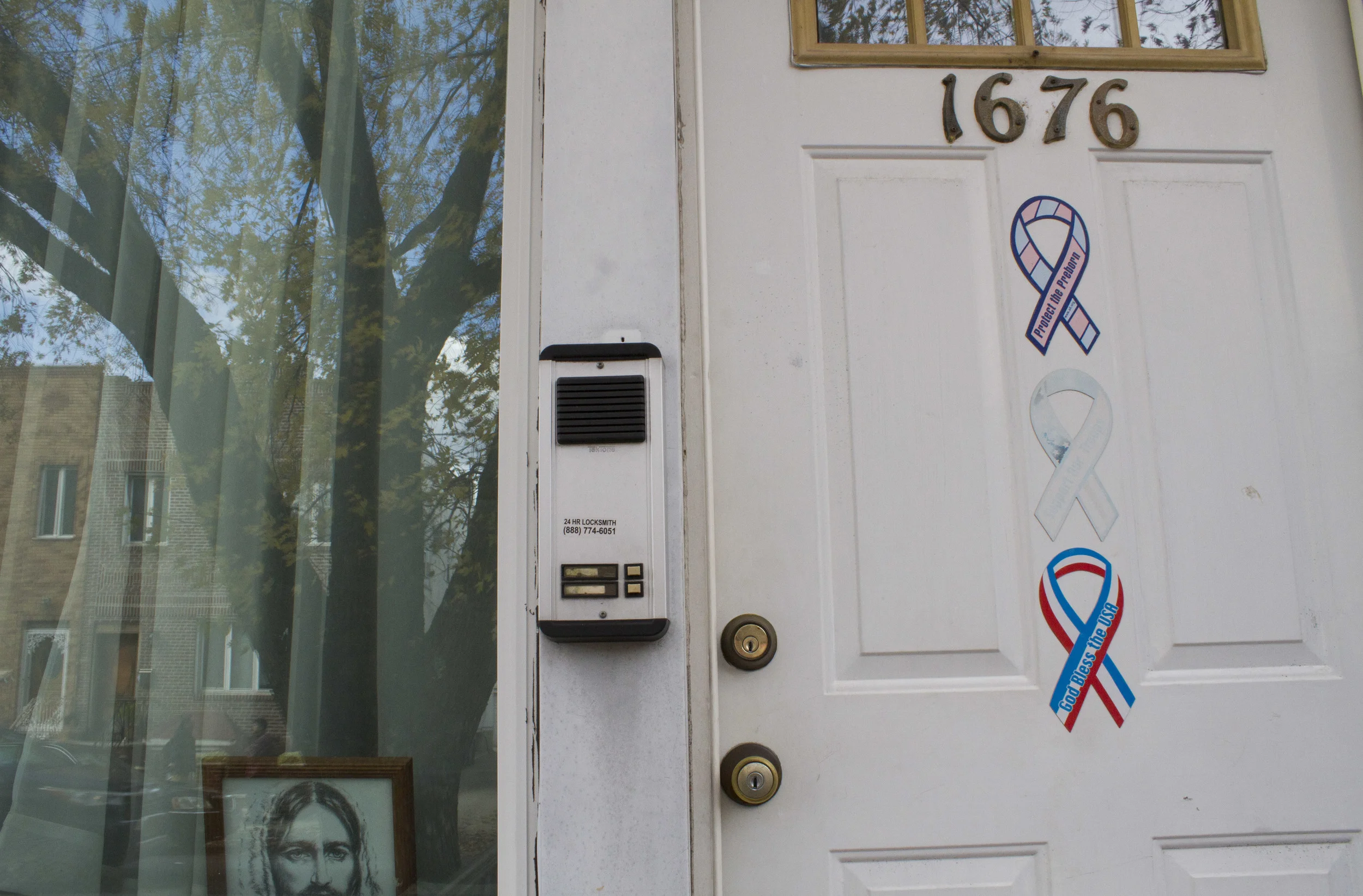 "Pray for the preborn" reads a sticker on 24-year-old Catholic Minister Melissa McChesney's apartment door. 