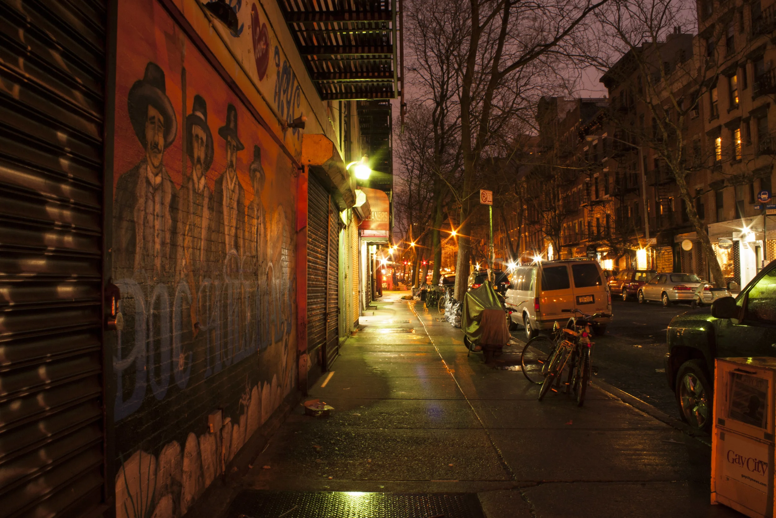 An empty street after rain. This is part of a project documenting early mornings in New York City's East Village neighborhood.