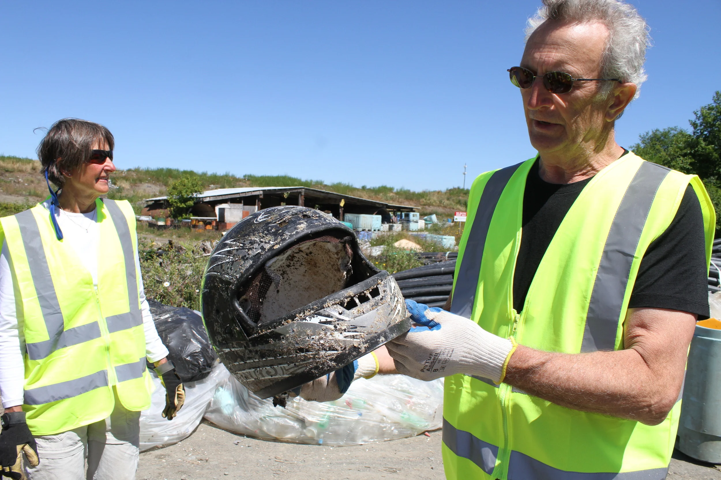  Randy Maillar holds a motorcycle helmet collected on Vancouver Island's west coast from the 2011 Japanese tsunami. &nbsp;© North Island Gazette.&nbsp; 