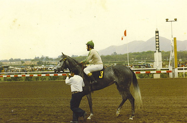 Riding at the racetrack in Lima.