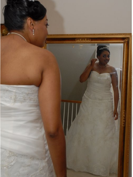 A photo of me in my custom wedding dress in 2008. I worked with this wonderful woman who helped to bring my vision to life. It took a lot of trust, but it worked out great!