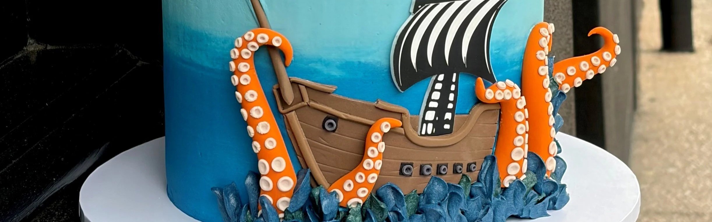 vanillapod-buttercreamcake-vanillapodspecialtycakes-brisbanecakes-7thbirthdaycake-pirateshipbirthdaycake-piratethemedcake-oceanoctopuscake.jpg