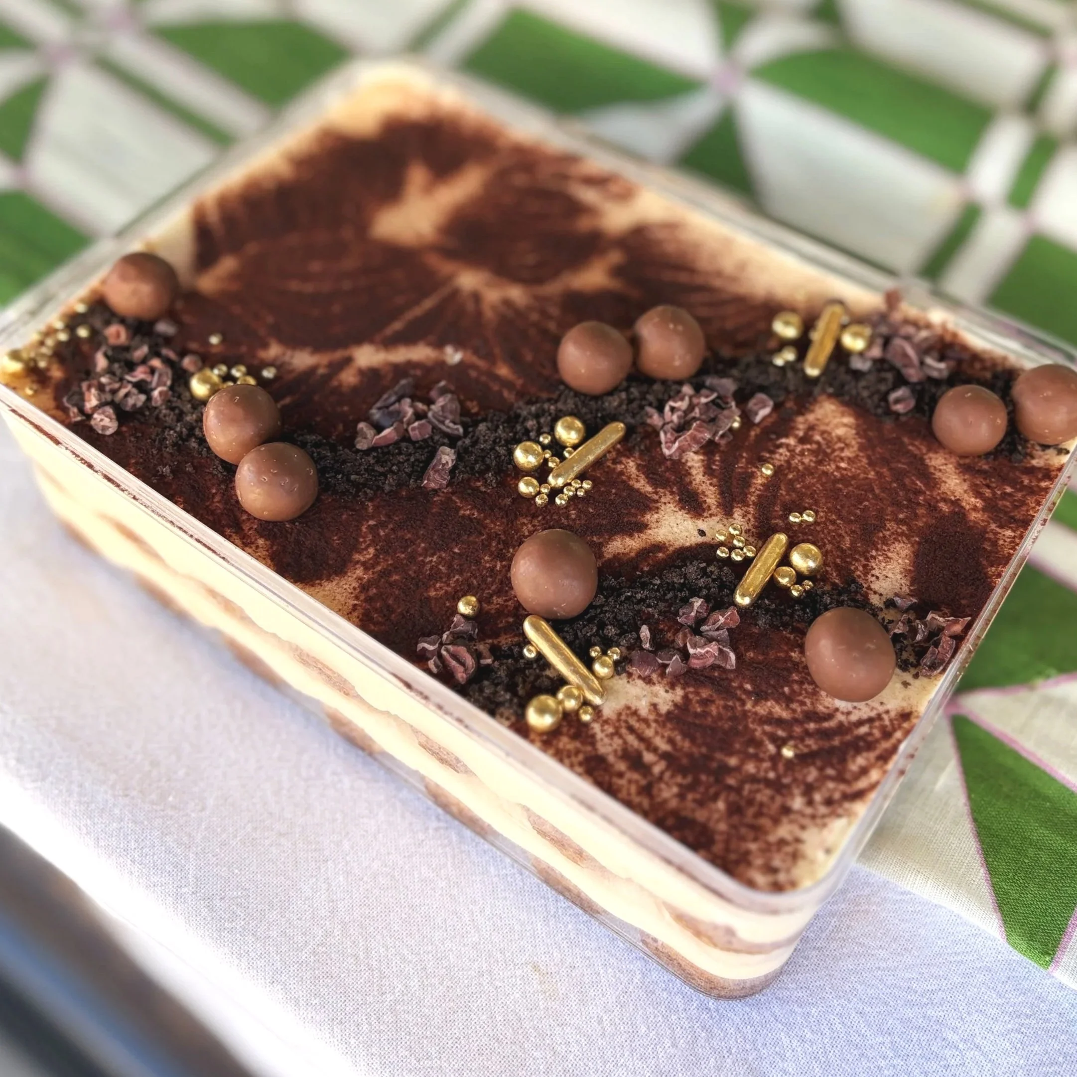 vanillapodspecialtycakes-christmastart-brisbanechristmas-christmascatering-vanillapod-gingerbreadhouse-christmastable-tiramisu-mangomisu-strawberryandpistachio-festivedessert.jpg