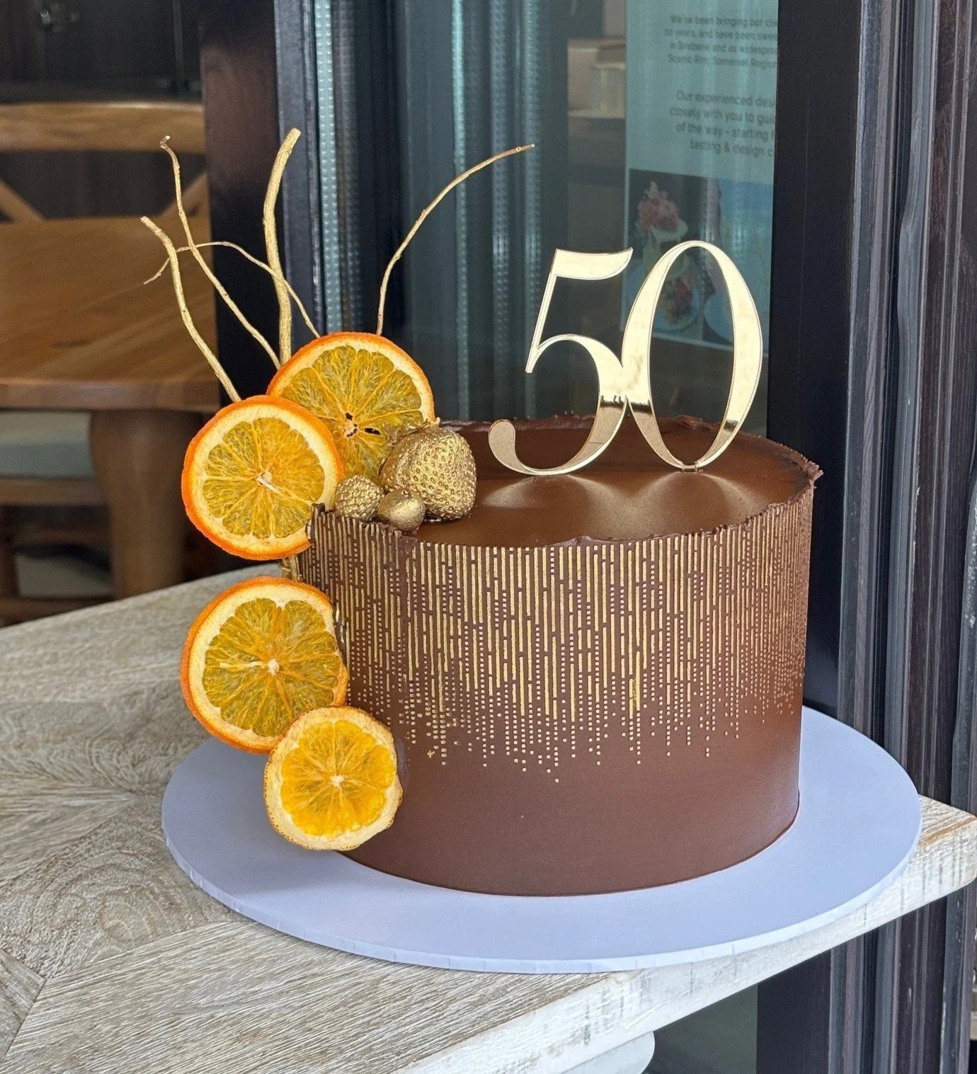 vanillapod-buttercreamcake-vanillapodspecialtycakes-brisbanecakes-ChocolateLuxewithGoldShimmer-ShimmerStencil-50thbirthdaycake-chocolateorangecake.jpg