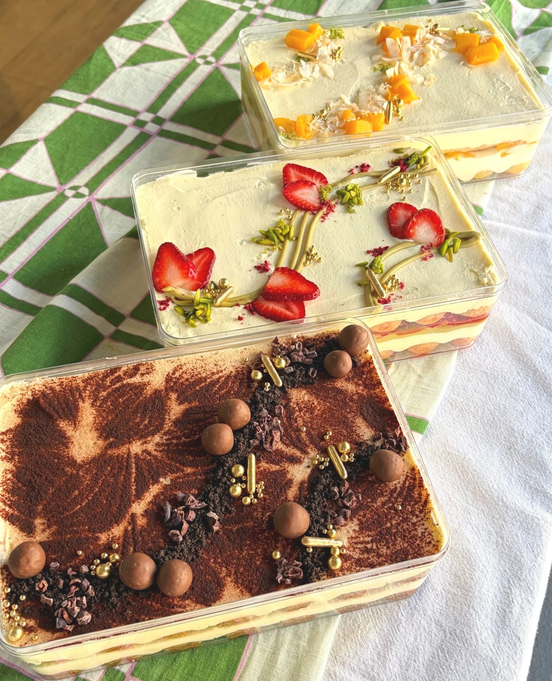 vanillapodspecialtycakes-christmastart-brisbanechristmas-christmascatering-vanillapod-gingerbreadhouse-christmastable-tiramisu-mangomisu-strawberryandpistachio.jpg