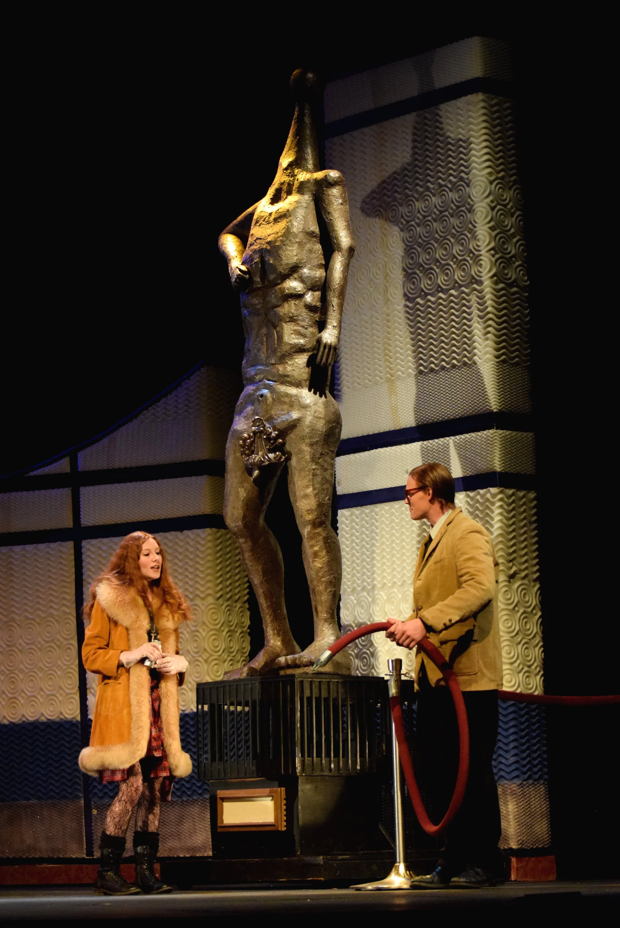 Evelyn and Adam discuss her plan to deface the statue.