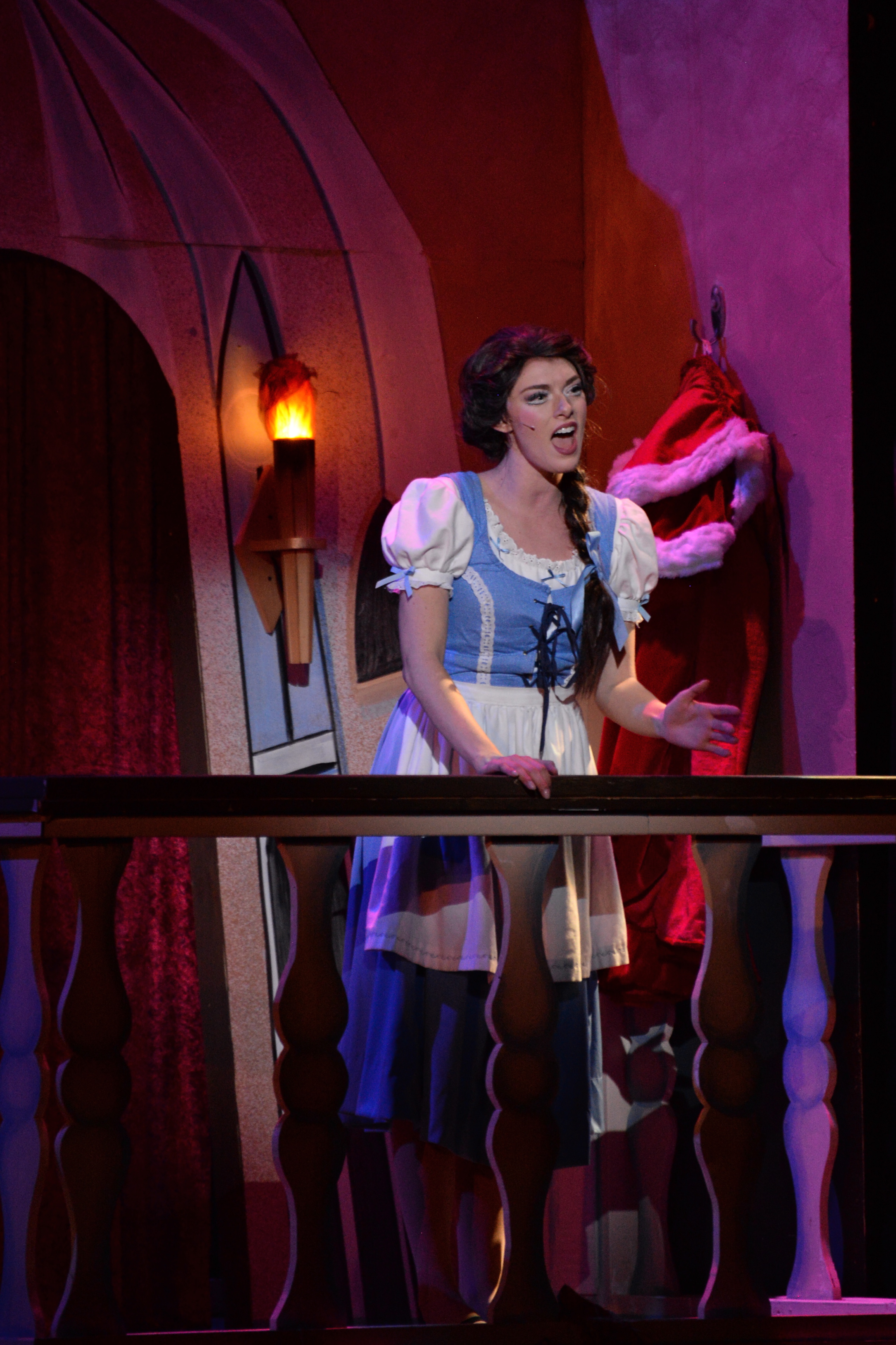 Belle in her room singing about "Home", moments after being imprisoned herself.