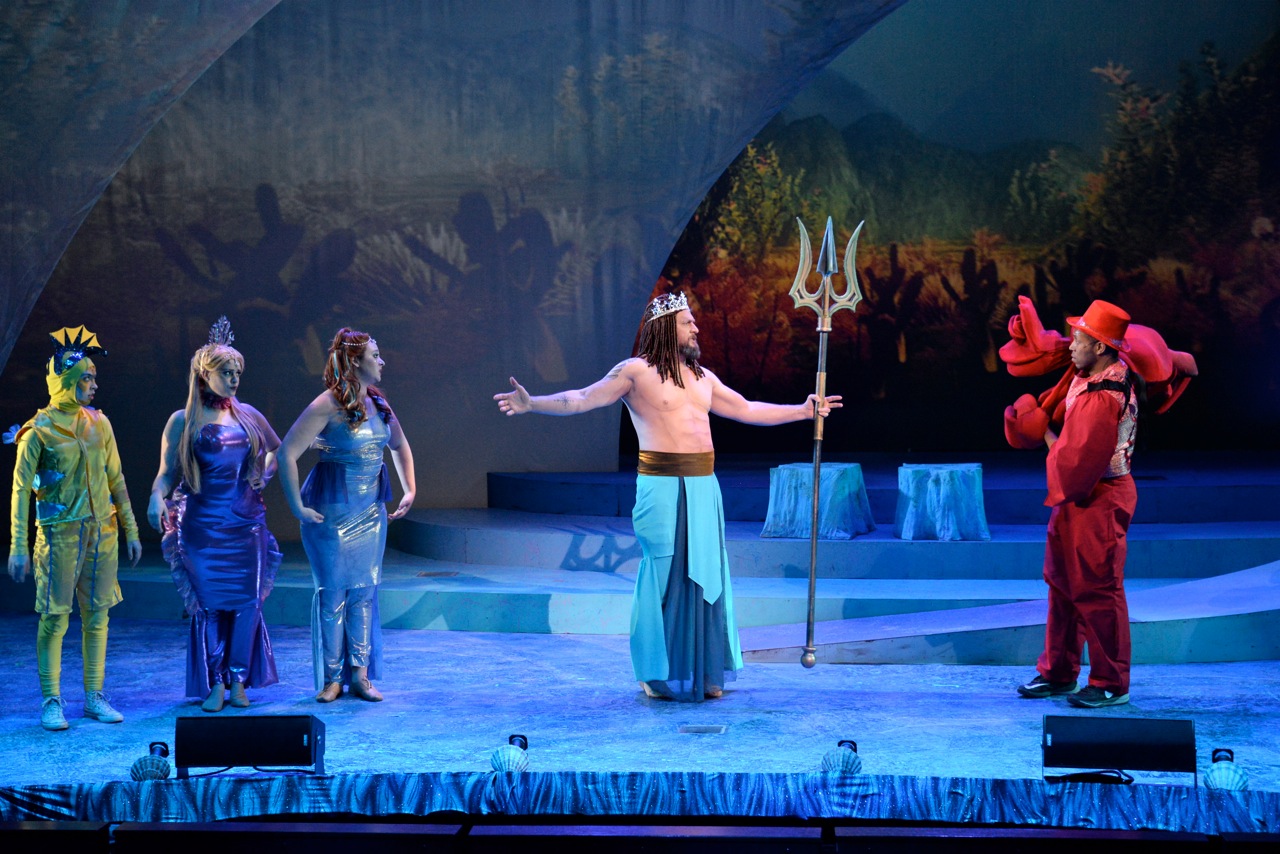 Triton and Sebastian speaking about Ariel
