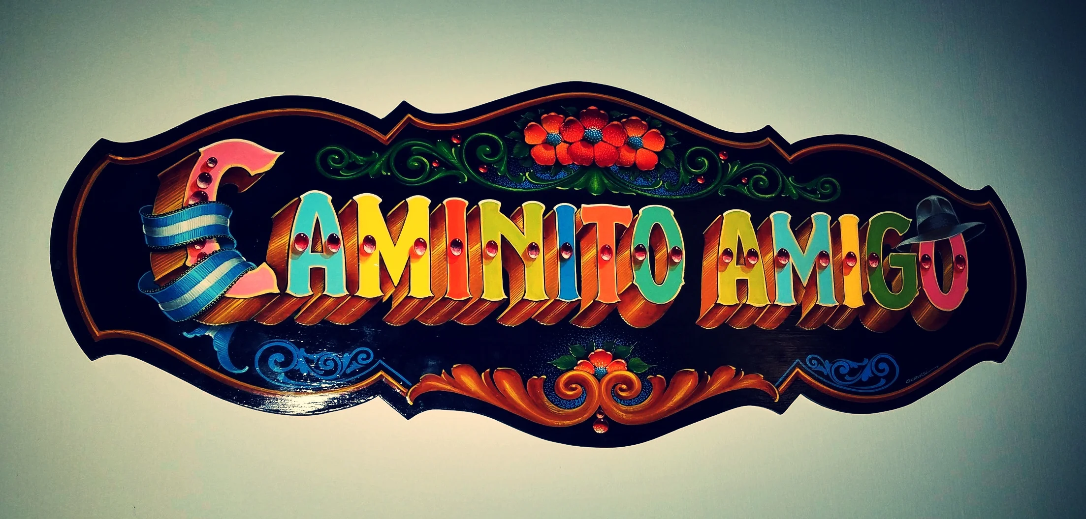 caminito amigo sign on the wall.jpg