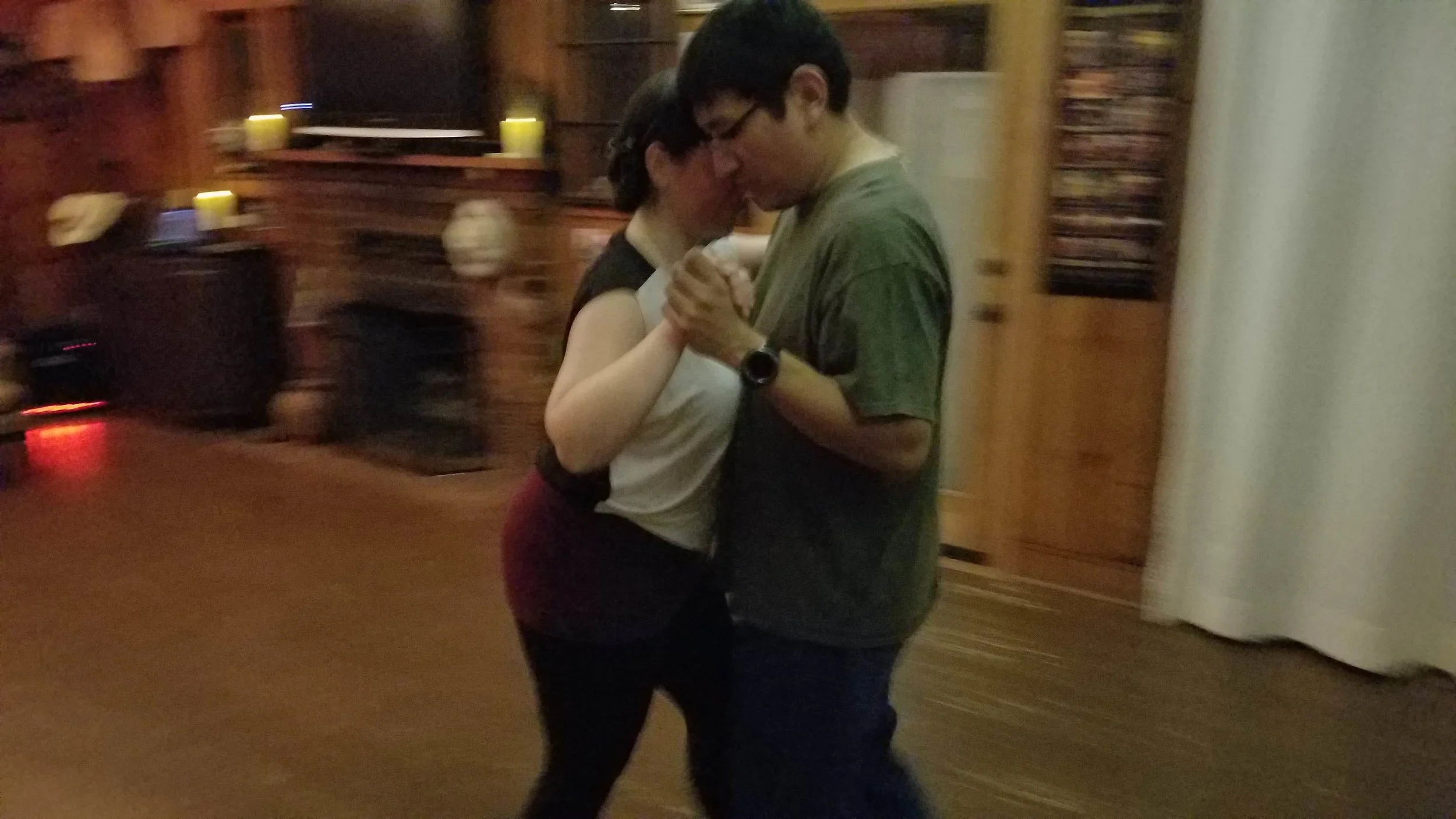 Beginners learning to enjoy Argentine Tango.