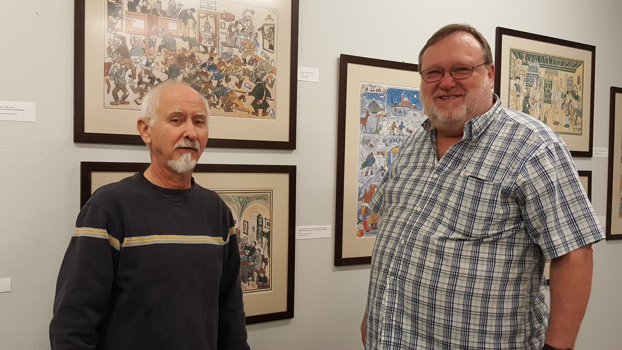 Czech Heritage Museum tour guide Kenny Lange talks with James Paul Hudec about Josef Lada, Hudec's family in Caldwell and on a very cold day, the weather. 