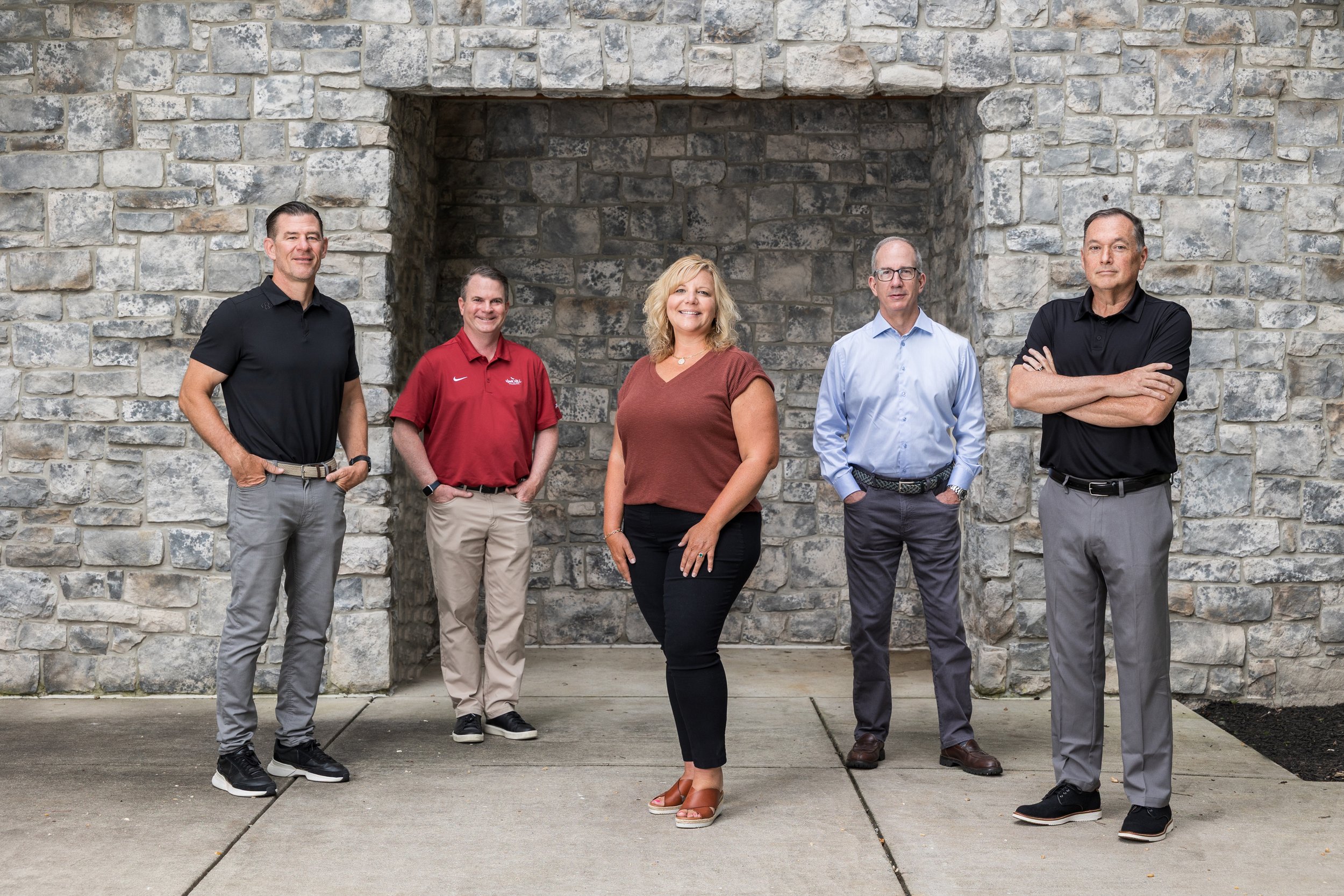 five people in group photo outdoor