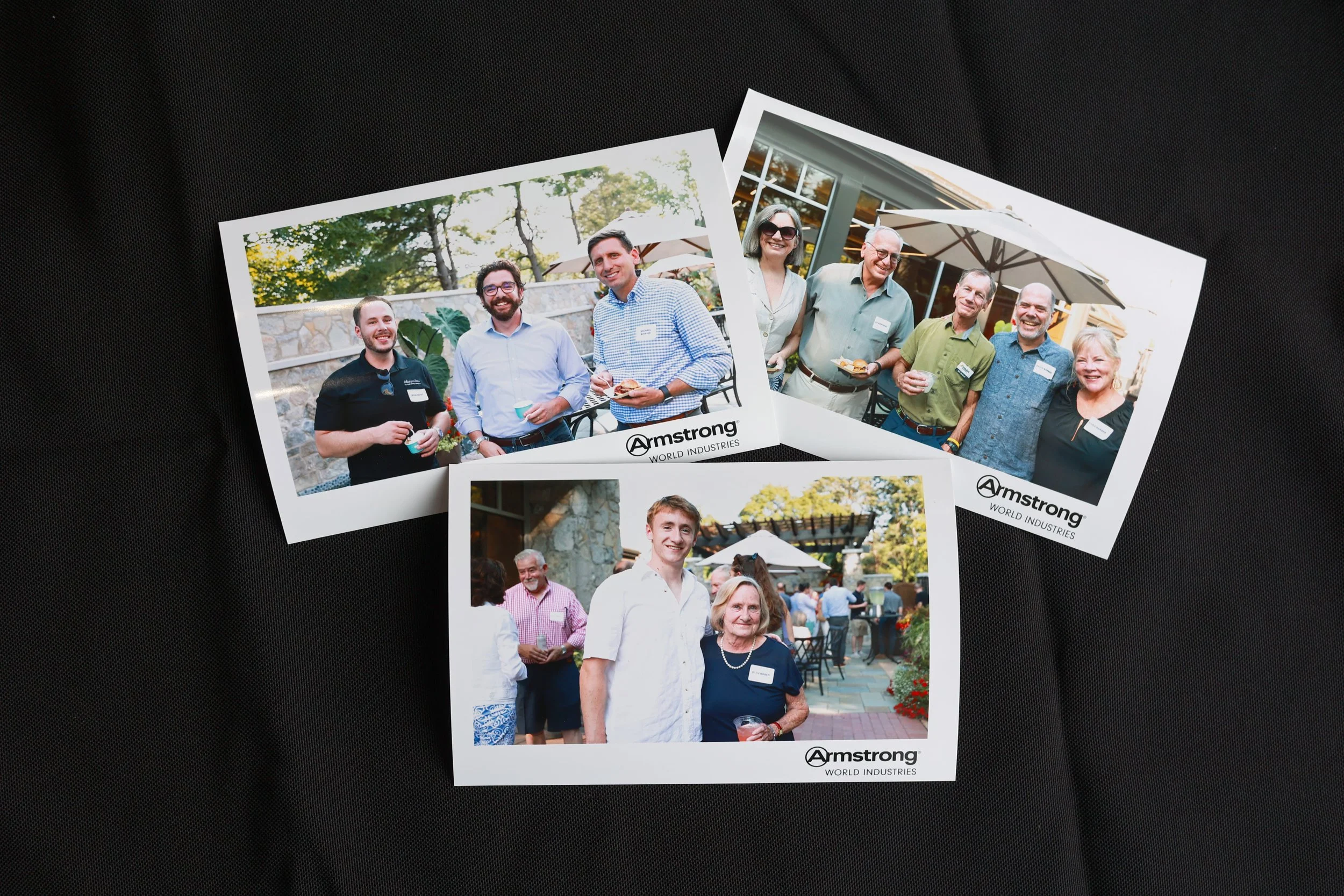 three photos printed on a table