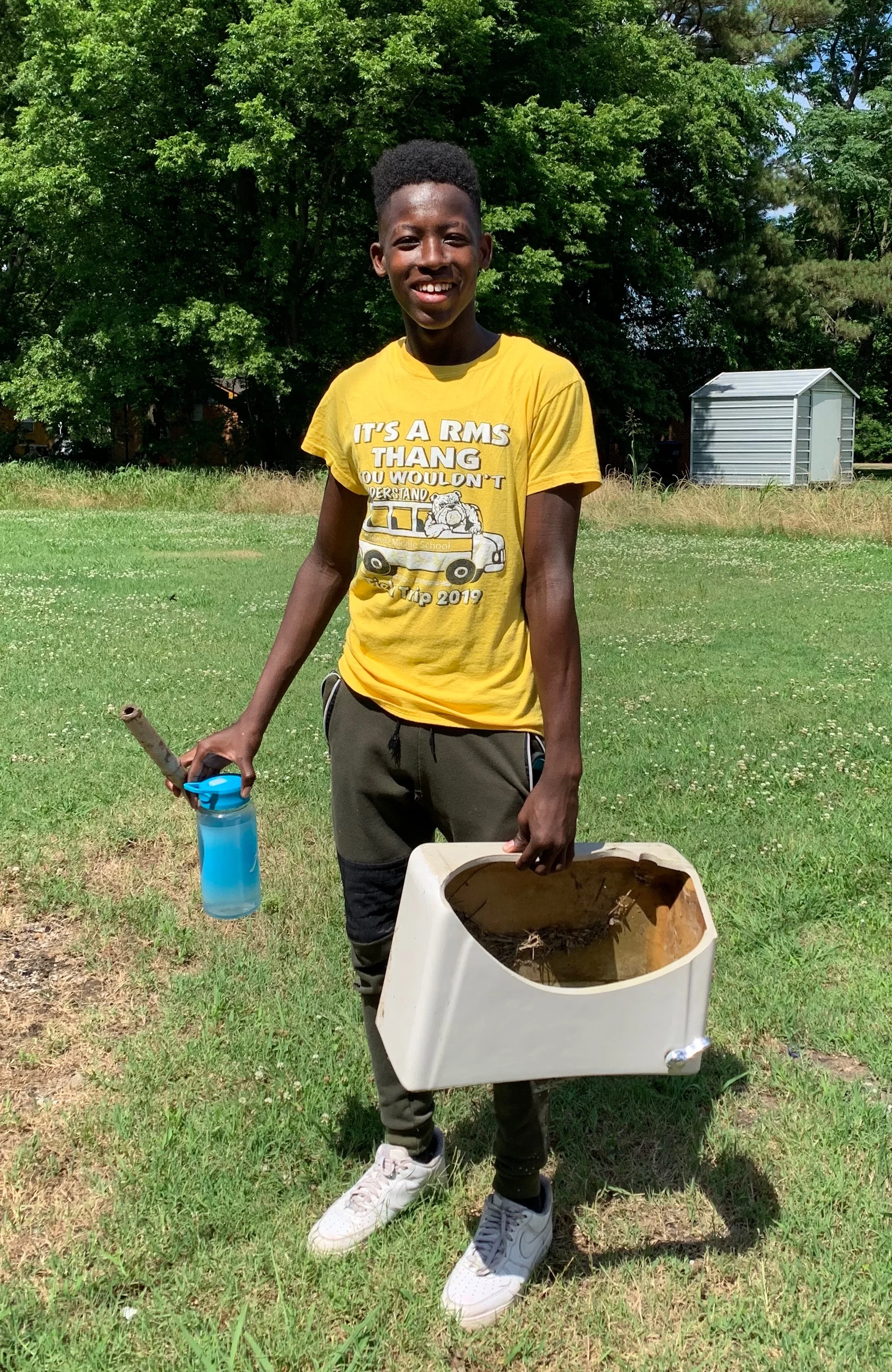 Mr. Harris picks up trash around Sunflower.