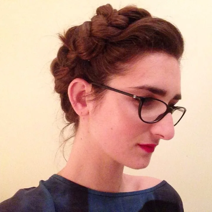 Leah shown here - after 12hrs of wearing the crown braid! Still intact, and looking amazing. Gah, I love this gal. 