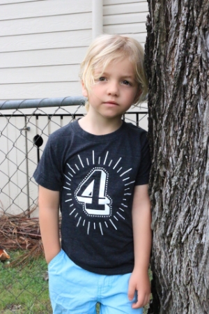 Ollie is wearing a Whistle & Flue shirt from MiniMacko
