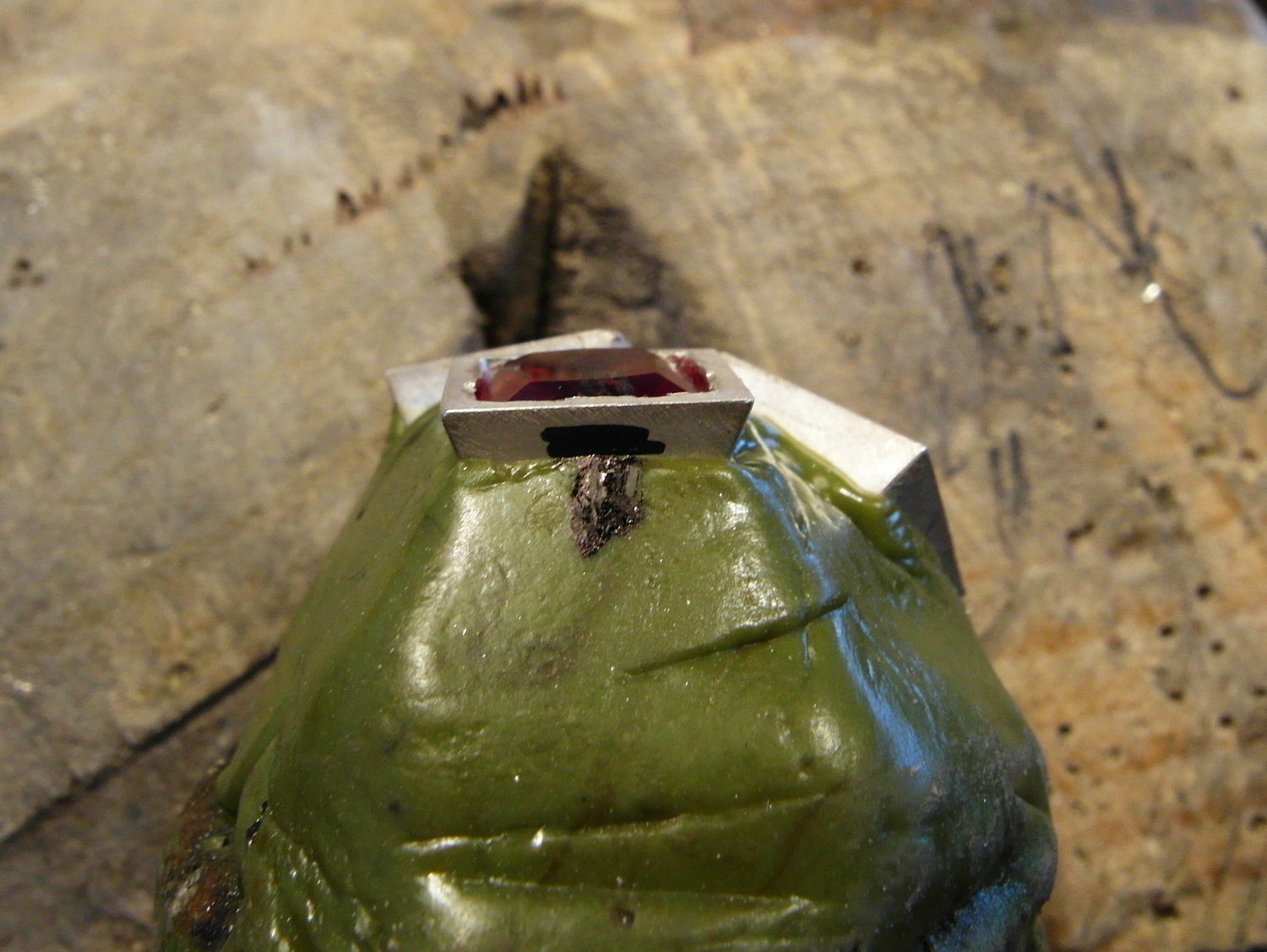  Here the stone is fitting at a good depth (and not rocking too much) into the cut step of the collet. 