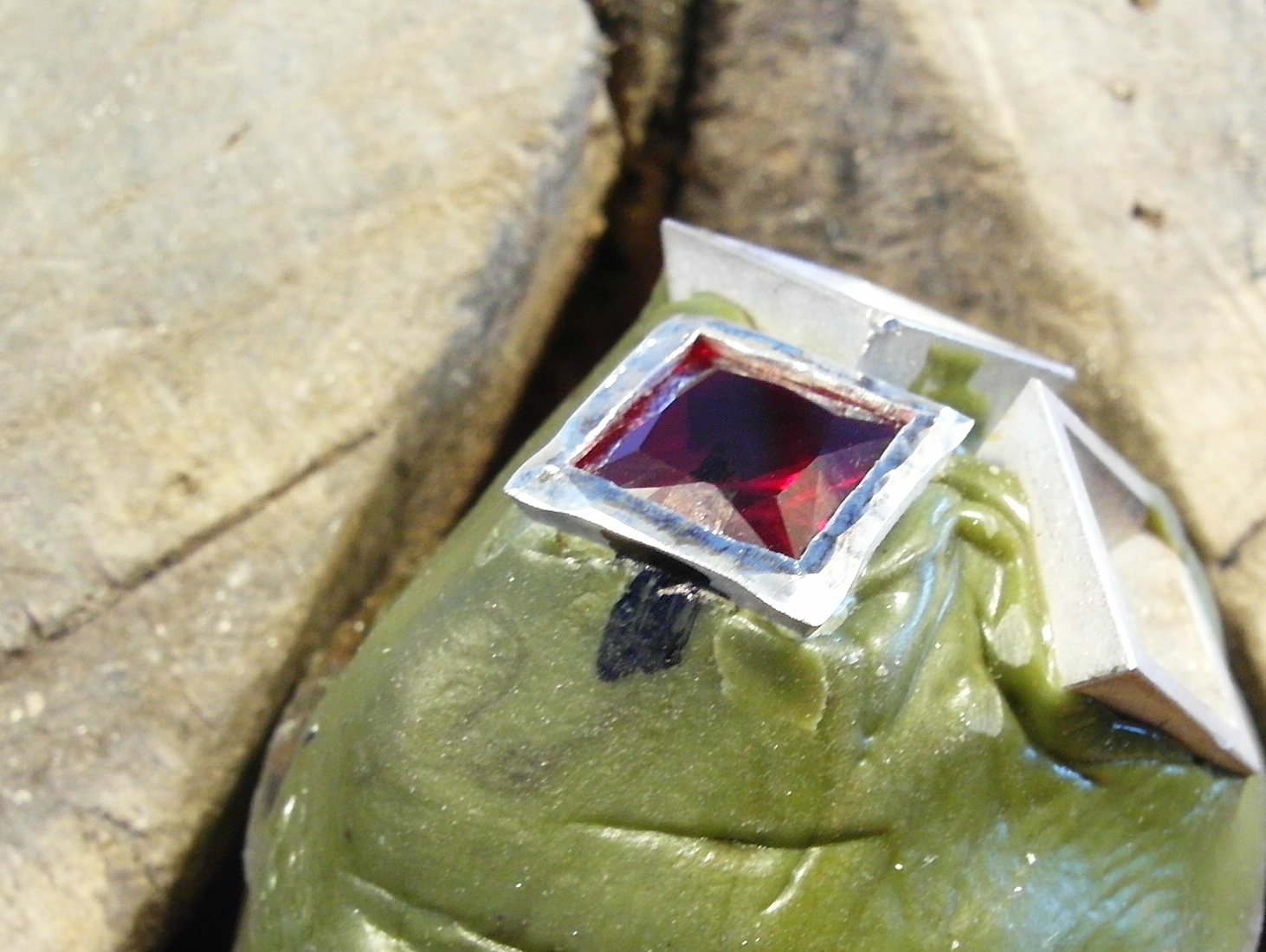  &nbsp;Carefully work on all 4 sides with the hammer, but do not bring the metal all the way onto the stone. Adjust the hammer hand piece now, reduce the tension on the spring to make the action lighter for this closer work. 