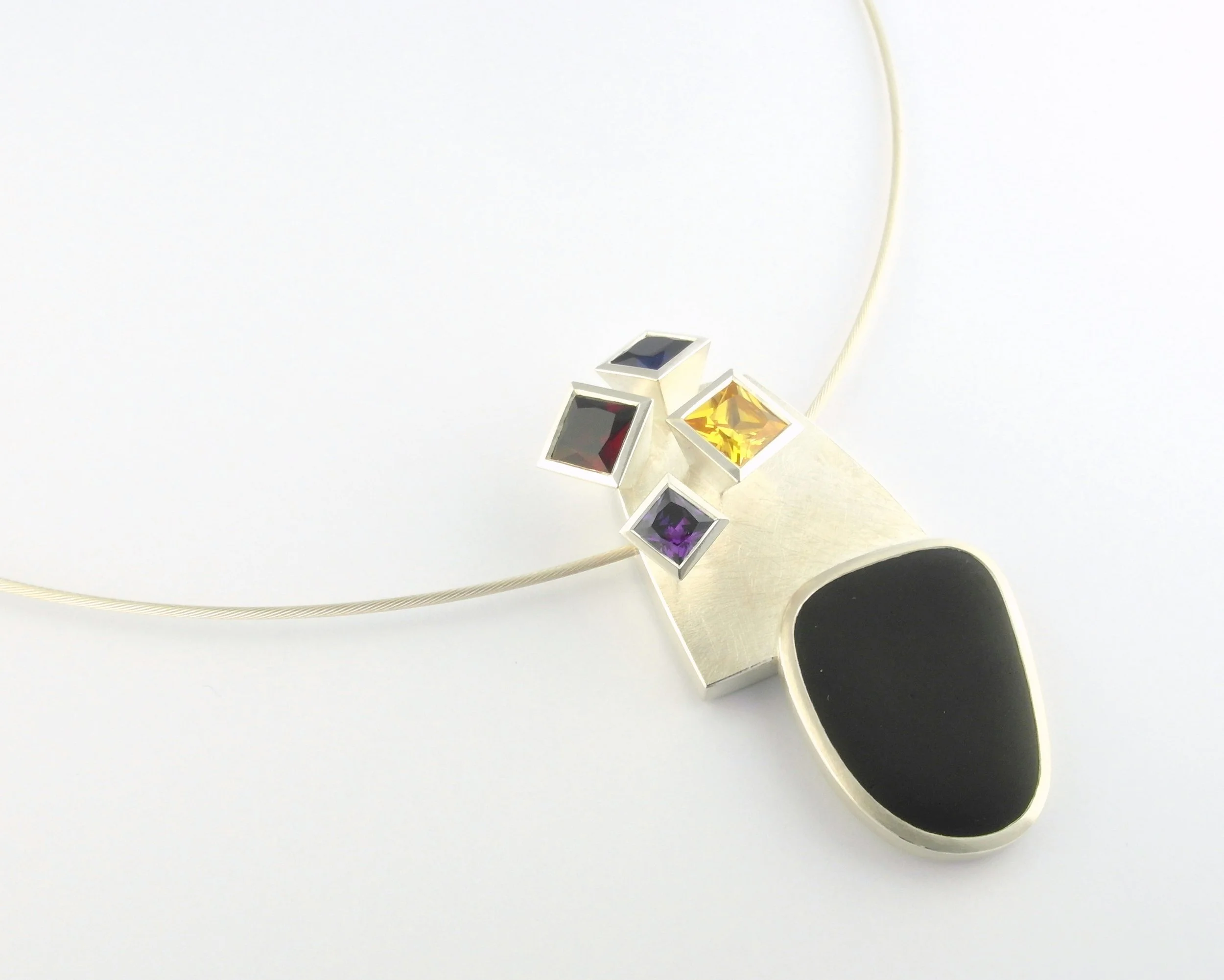 Silver, beach pebble, synthetic sapphires