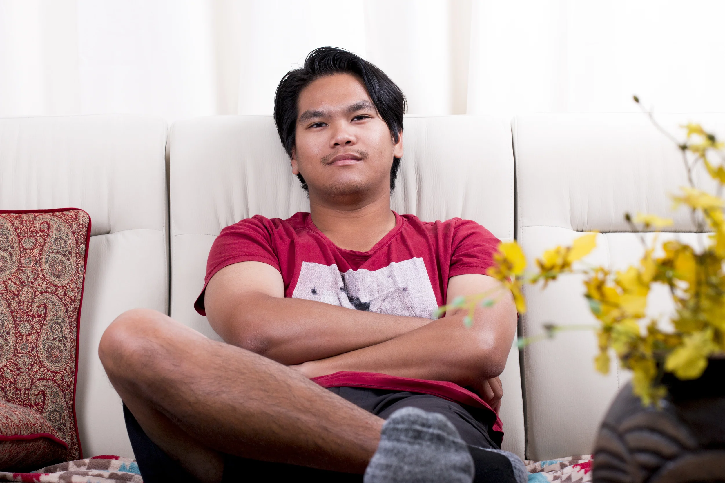  Camera Setup: Three flashes were used, two from both sides (left and right) and one with umbrella behind me as I face him. I instructed him to look at my lens as I begins to take this photo.  ---  Camera Setting:  • Aperture: f/7.1  • Shutter Speed: