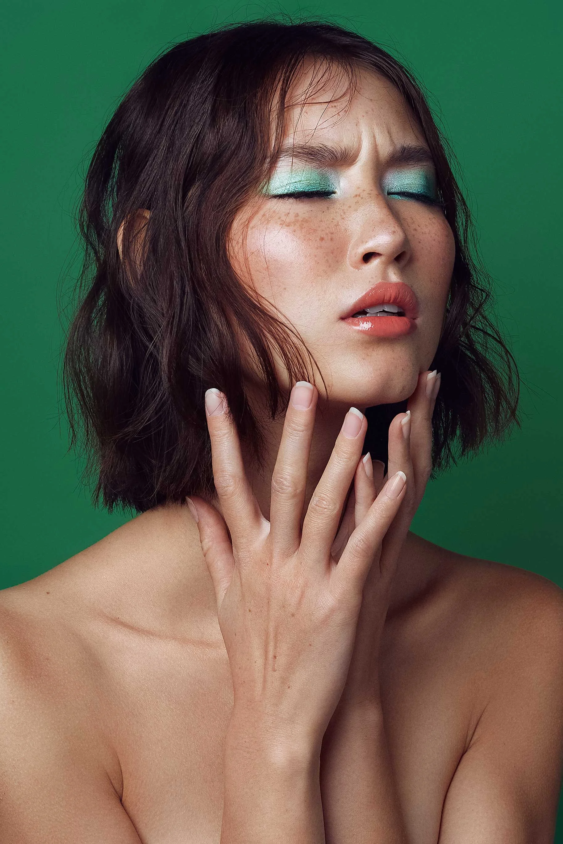  Model expressing emotion in beauty portrait 