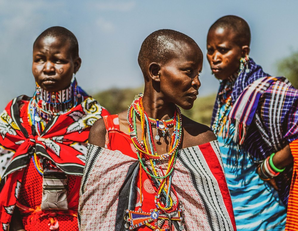 Isei,+Mary,+and+Kirine+at+the+borehole+to+fetch+water.+Photo+by+Katie+Sugarman.jpg