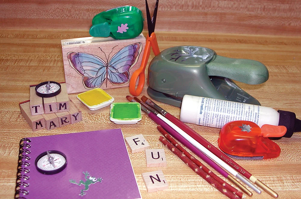 This butterfly journal used a rubber-stamped image that was water-colored. The butterfly was cut out and glued to a measured piece of cardstock. It was then personalized with a rubber stamp alphabet and detailed with a permanent black marker.