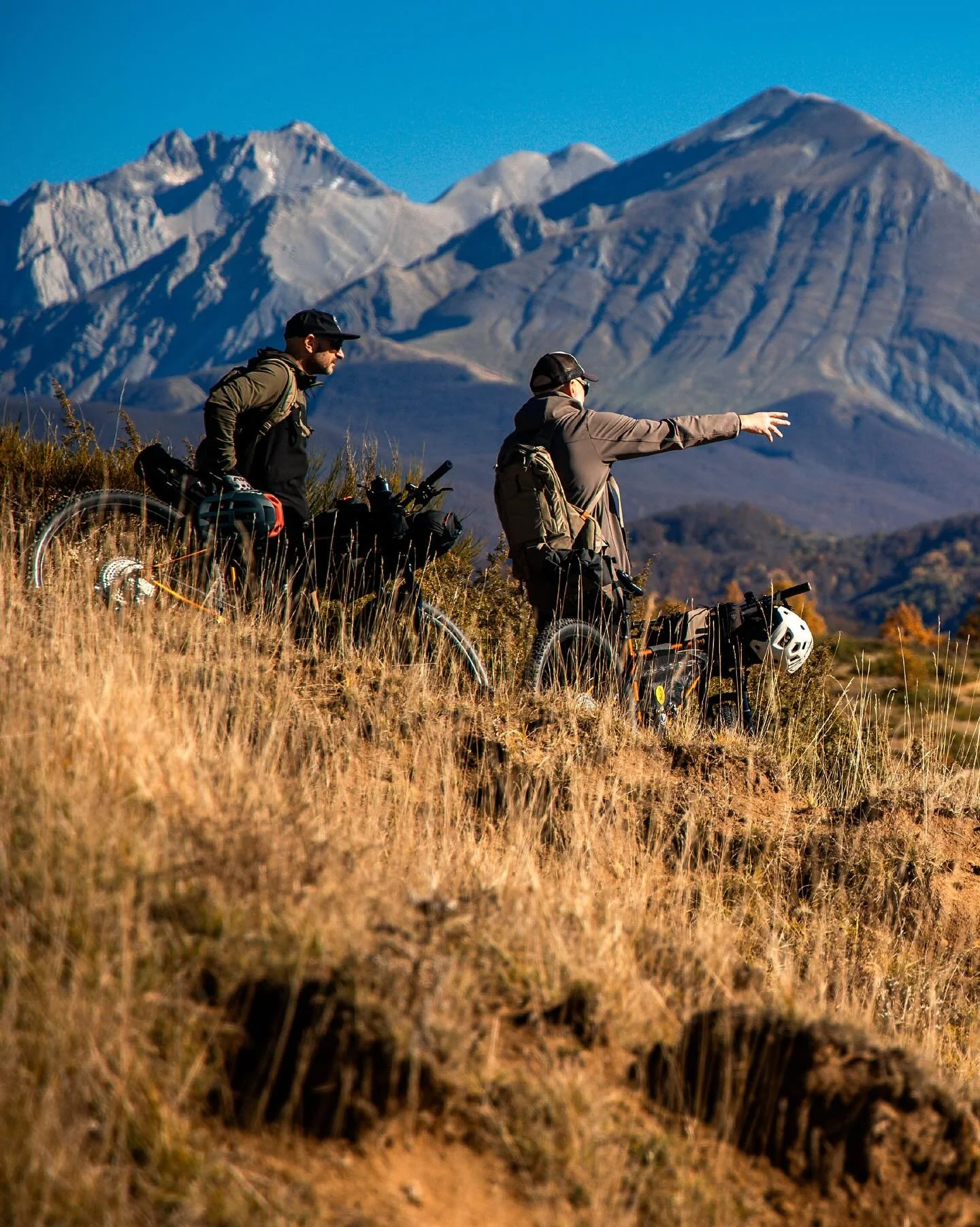 After every expedition, we return to our mountains, where peaks rise like guardians and welcome us home. Autumn paints the valleys in firelight, and the crackle of a lakeside campfire reminds us why we always come back.

#bikepackinglife #adventureby