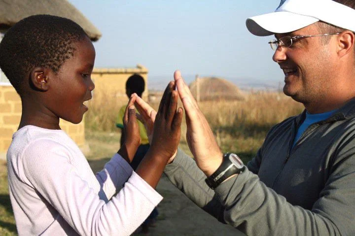 JVR and his sponsor child.jpg