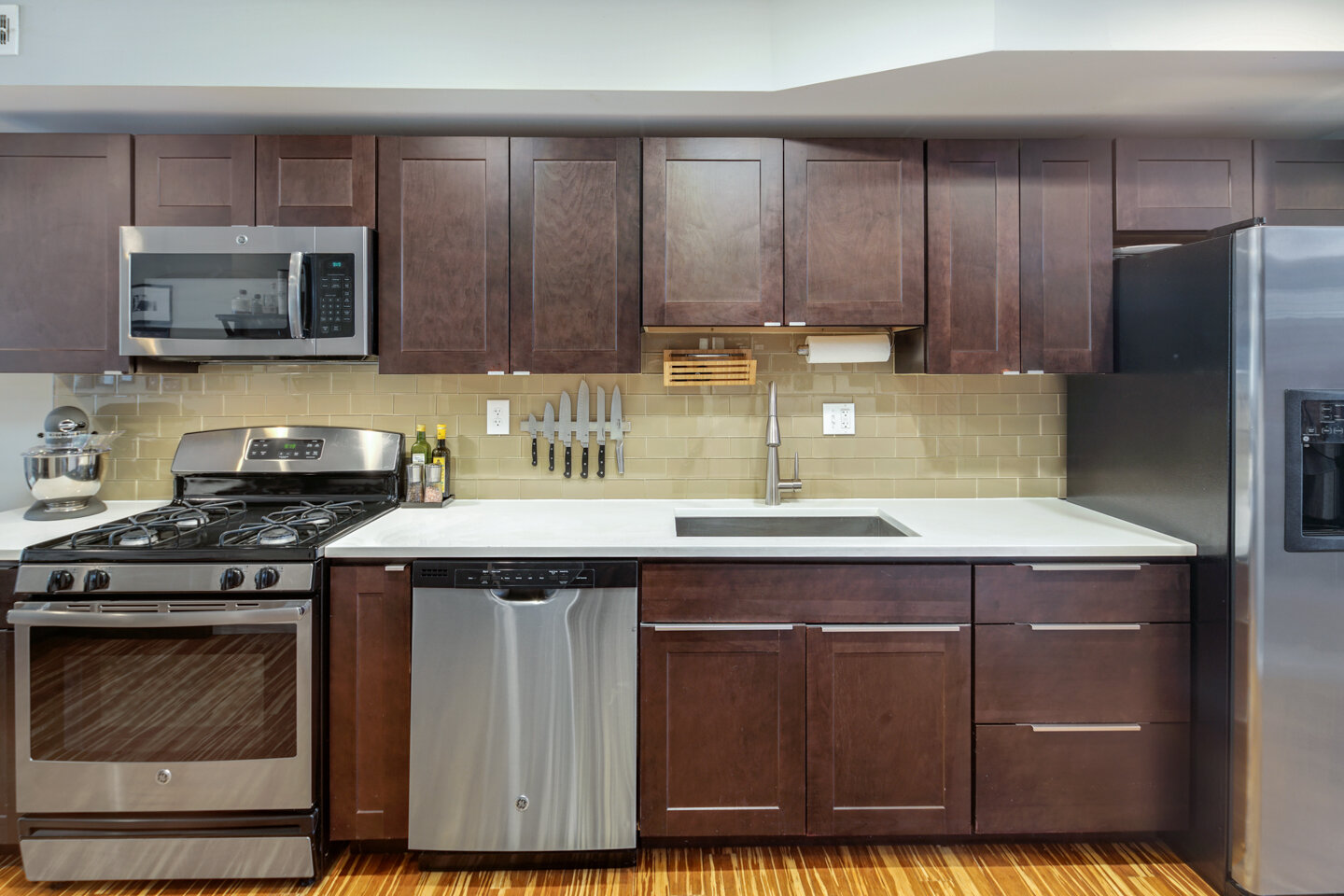  Cabinets should be organized and spotless. Dishsoap can hide neatly under the sink.  