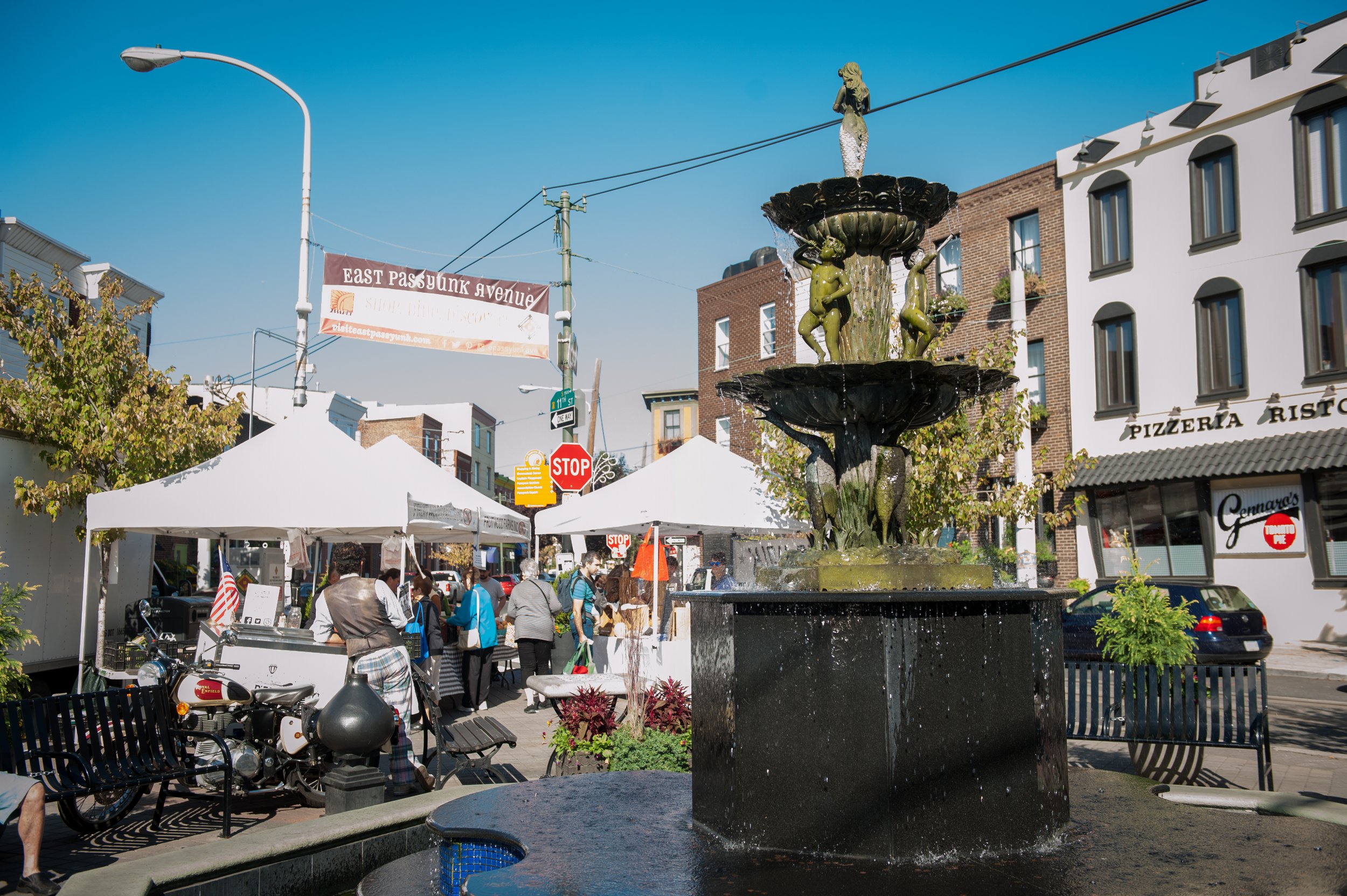 farmers market set around the singing fountain in Passyunk Square Philadelphia