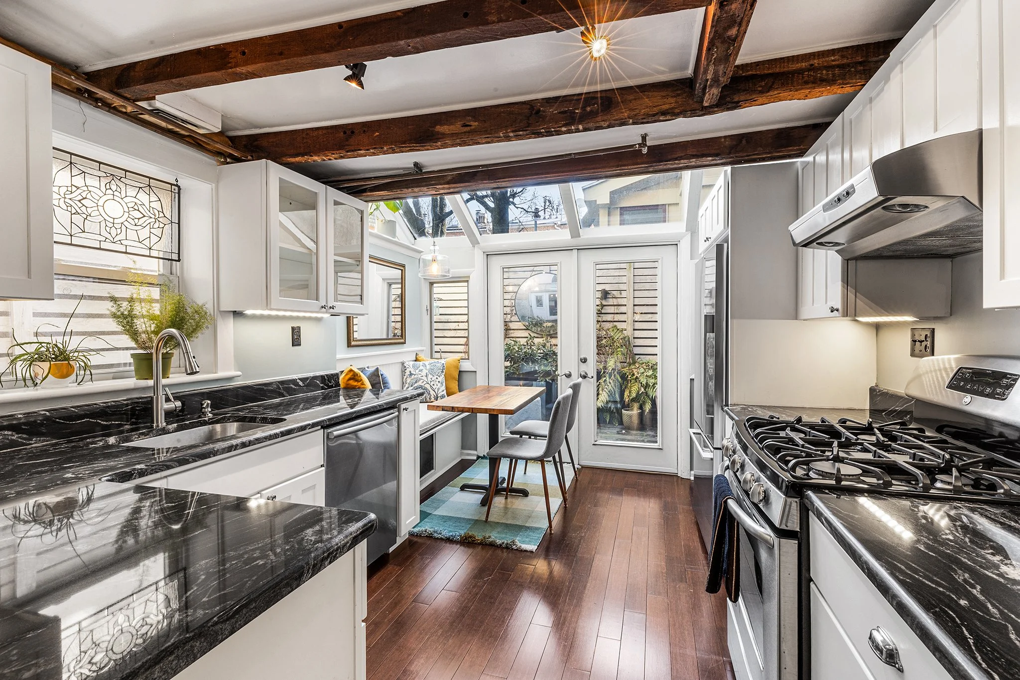 ✨JUST LISTED and OPEN HOUSE✨ When our client purchased this house we all fell in LOVE with the kitchen with a light filled solarium. She's now on the market thanks to a growing family and the rest doesn't disappoint. Let's start with that coveted Que