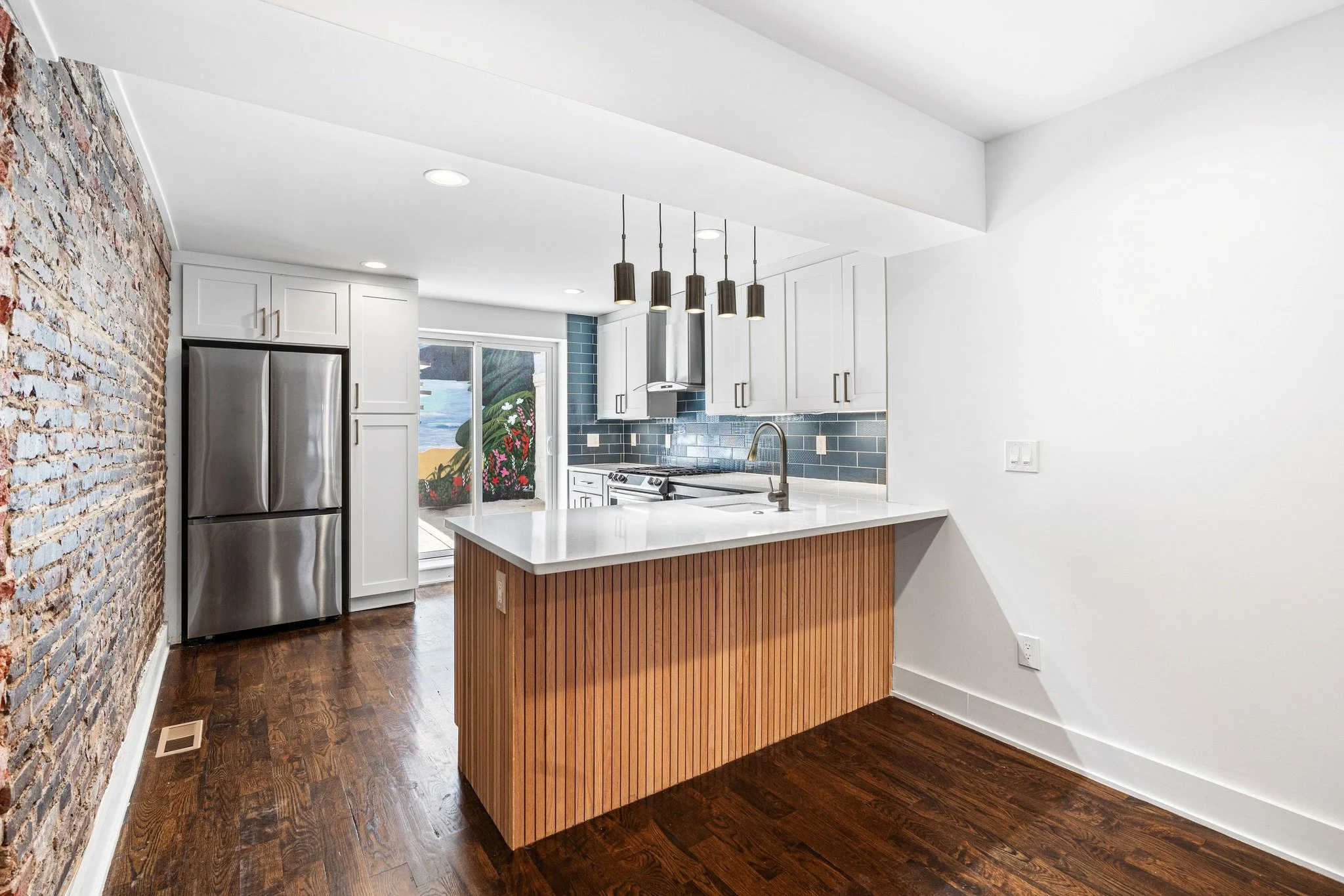 Roooftop views, a private mural, soaking tub and heated fireplace 🔥 

2125 S 9th St isn't your average South Philly row home. We're talking 4 beds, 2.5 baths, THREE outdoor spaces (balcony, backyard and 360 degree roofdeck views). There is also a pr